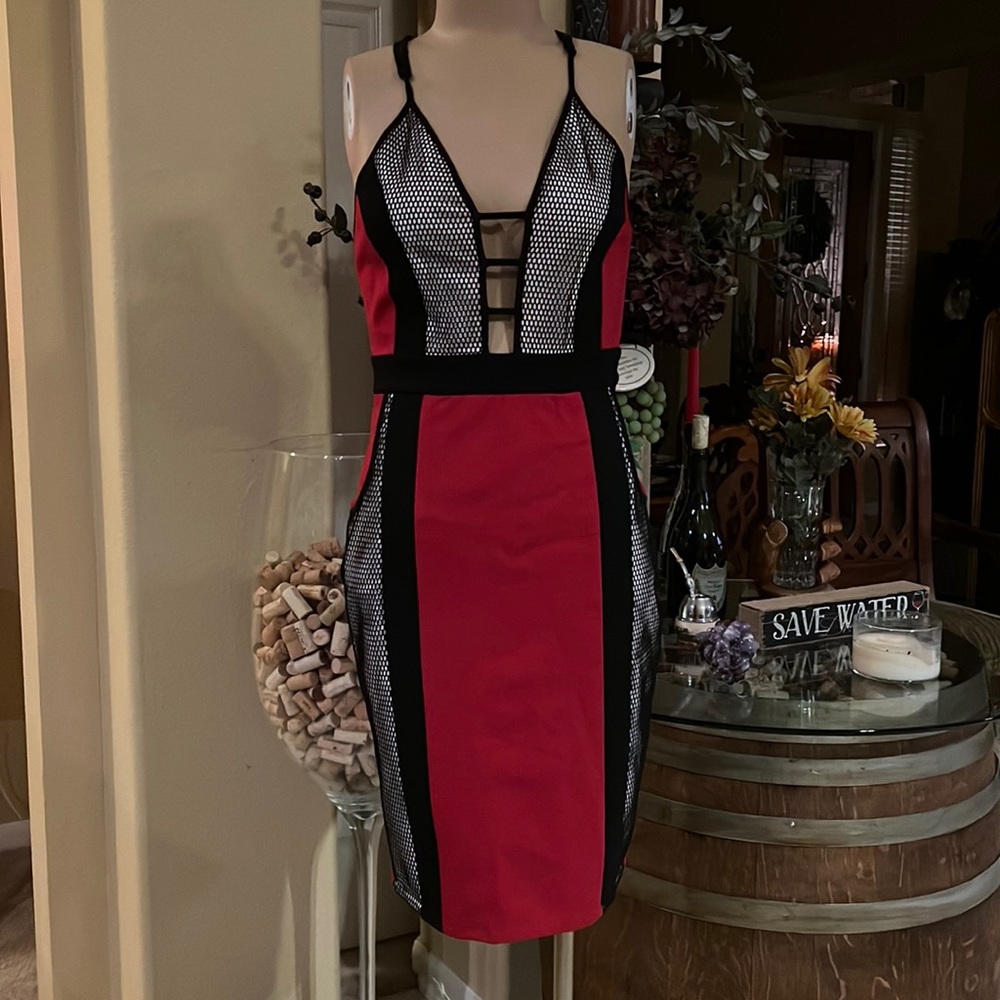 Trendy black fishnet and red strappy dress with pockets